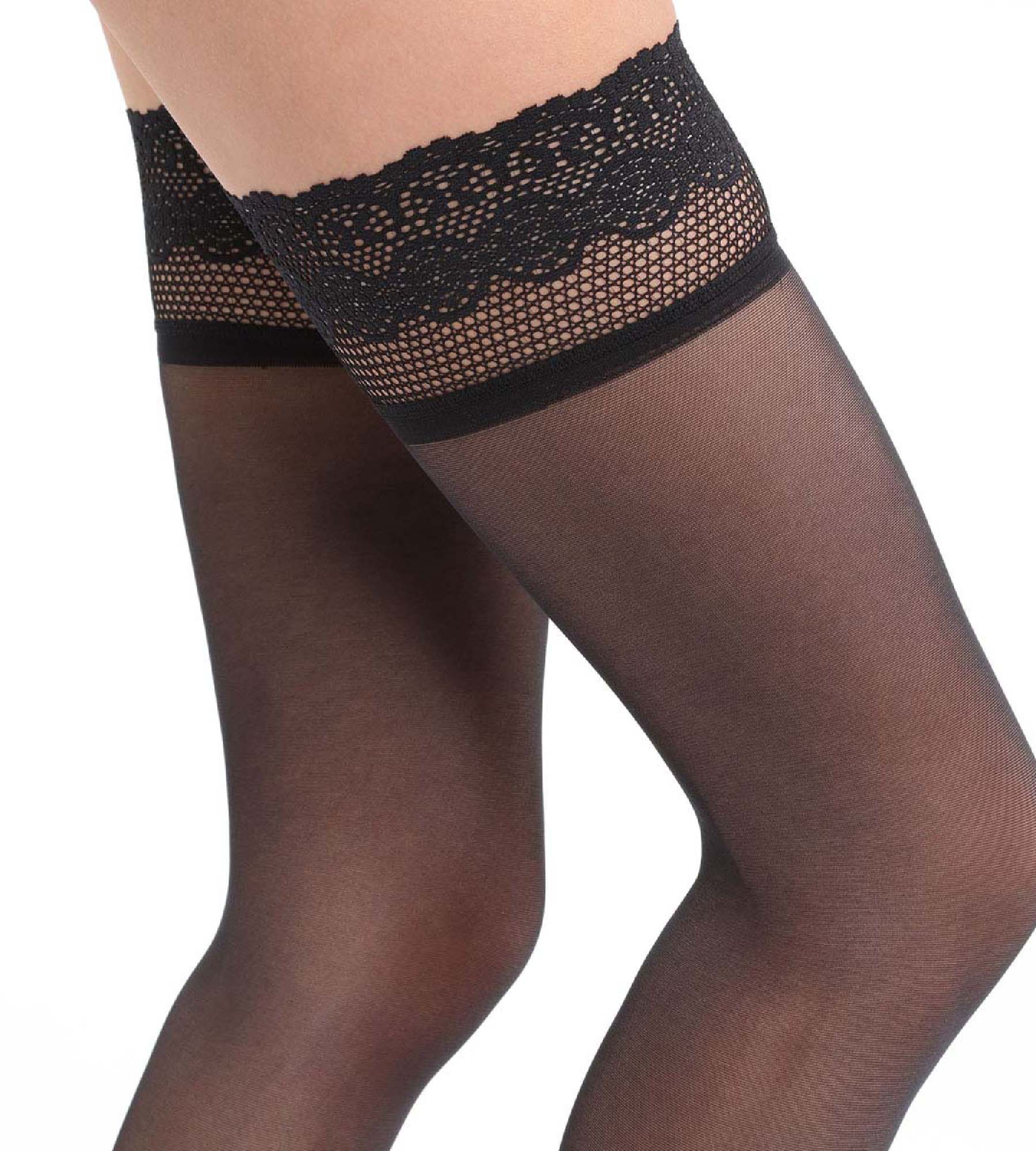 Black lace-trimmed sheer stockings on a white background